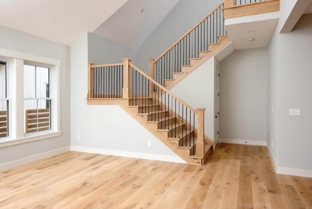 Custom staircase with hardwood flooring